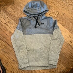 Nike dry fit hoodie with front pocket. Never worn!!